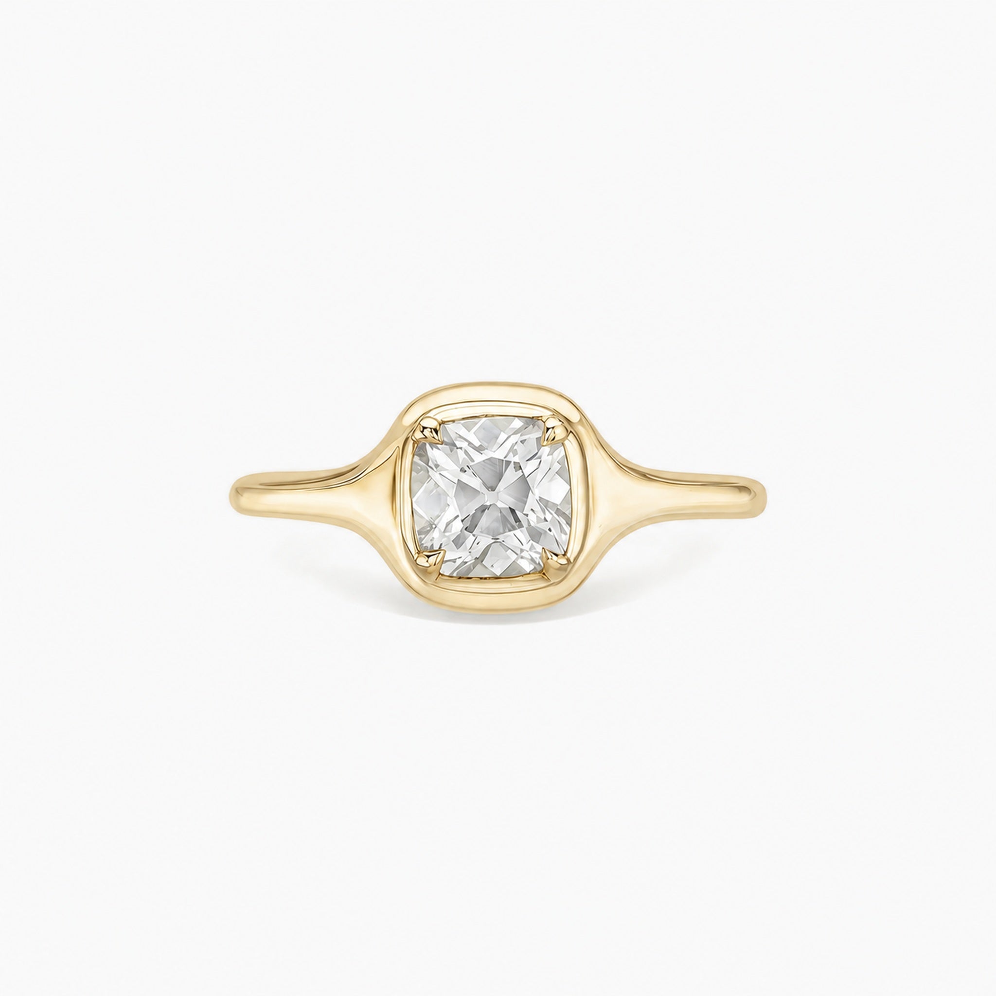 1 ct Cushion-Cut Moissanite Bezel-Prong Ring in yellow gold vermeil, front view.