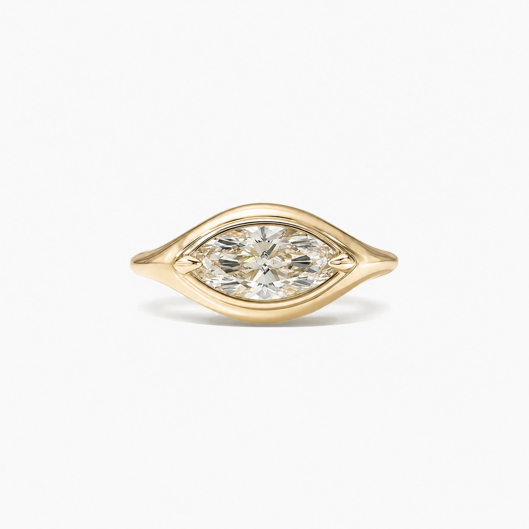1 ct East-West Marquise-Cut Moissanite Bezel-Prong Ring in yellow gold vermeil, front view.