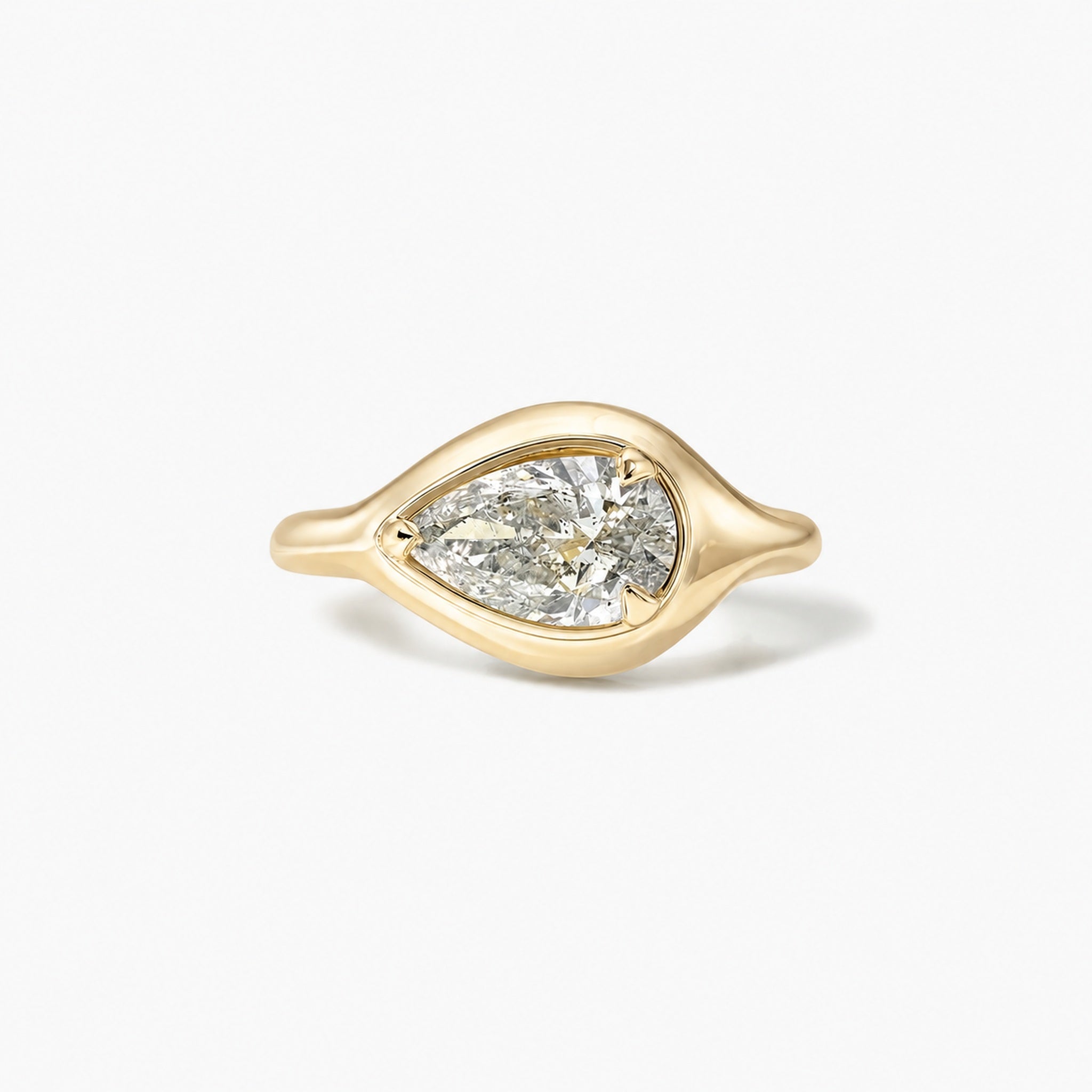 2 ct East-West Pear-Cut Moissanite Bezel-Prong Ring in yellow gold vermeil, front view.