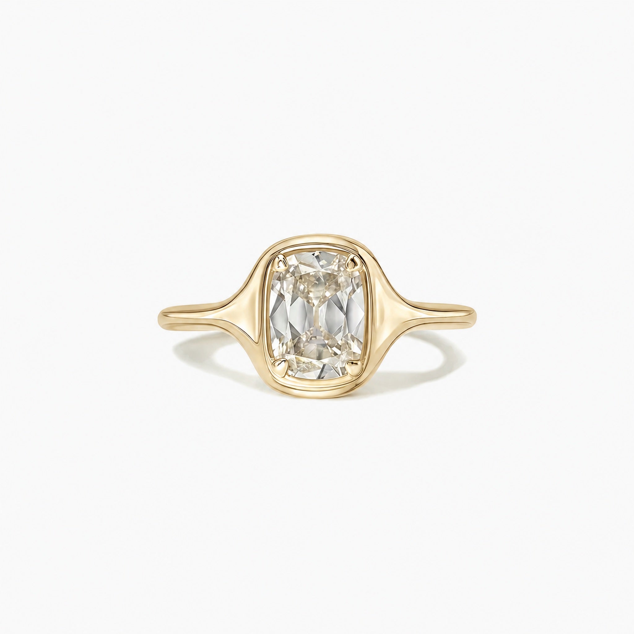 2 ct Elongated Cushion-Cut Moissanite Bezel-Prong Ring in yellow gold vermeil, front view.