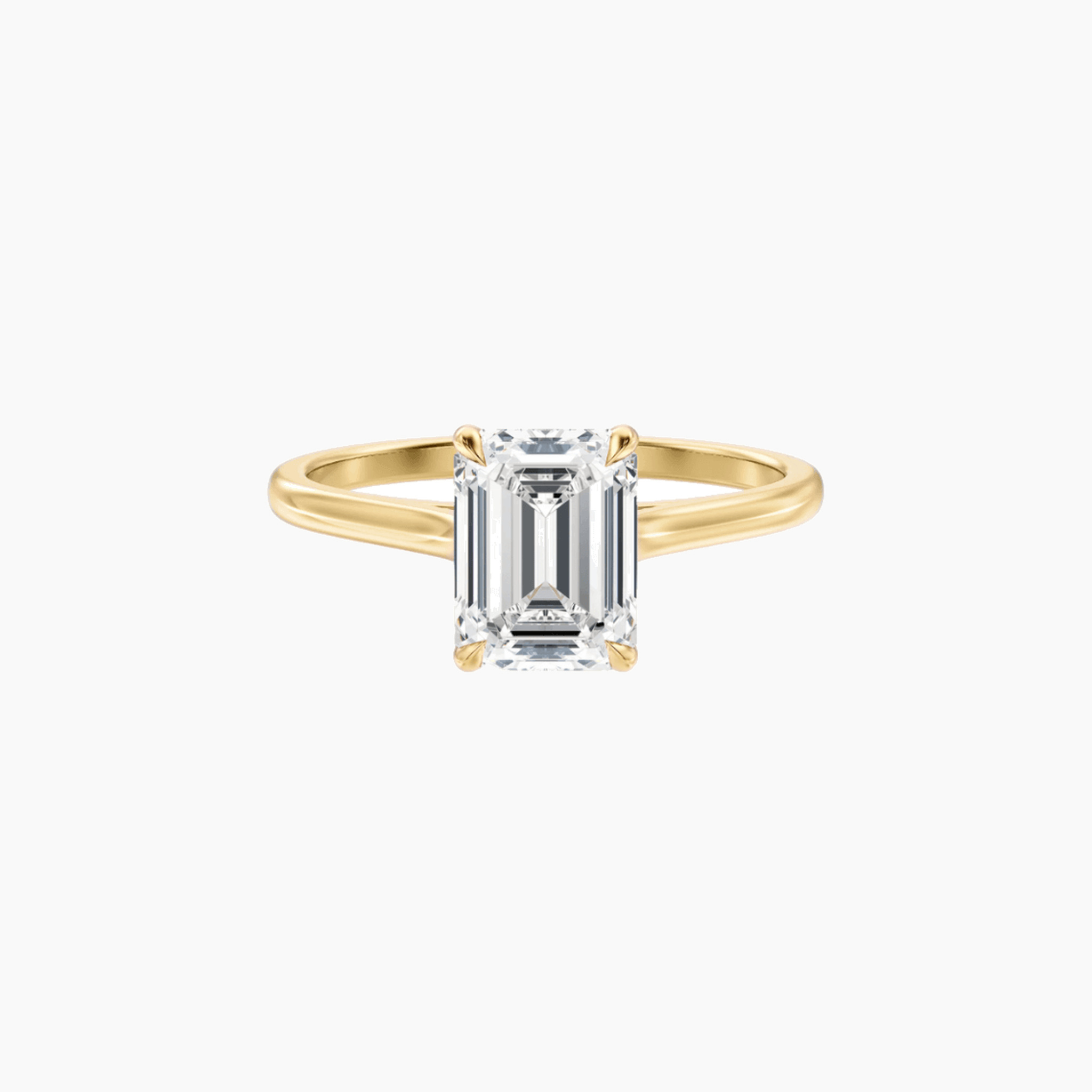 2 ct emerald-cut moissanite solitaire ring in yellow gold vermeil, front view.
