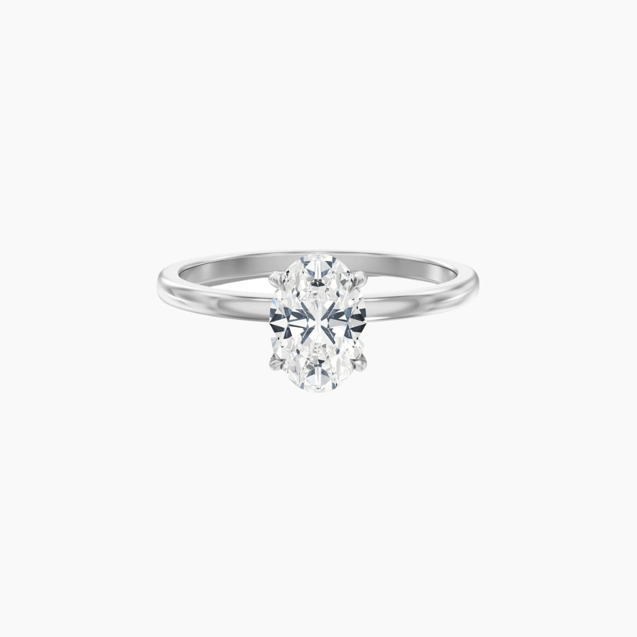 2 ct oval-cut moissanite solitaire ring in white gold vermeil, front view.