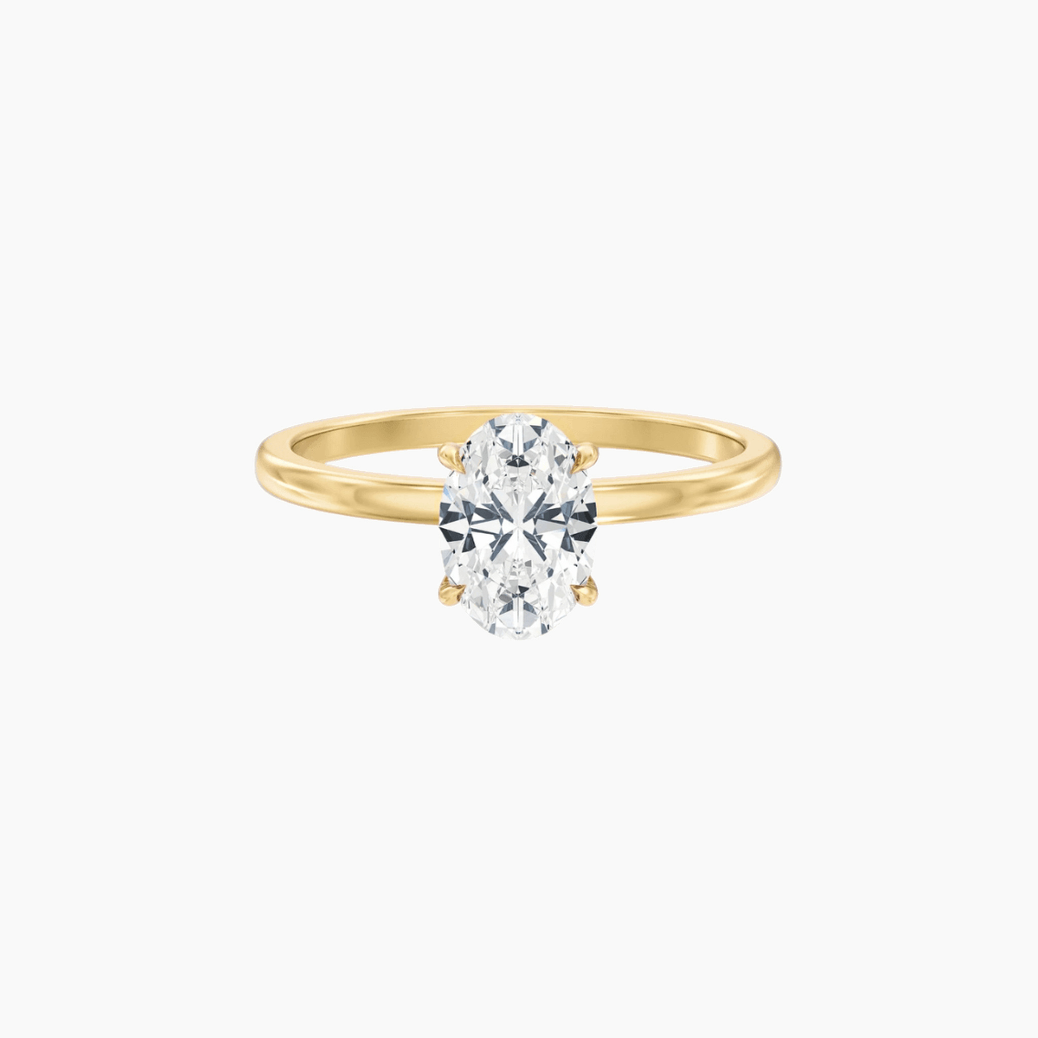 2 ct oval-cut moissanite solitaire ring in yellow gold vermeil, front view.