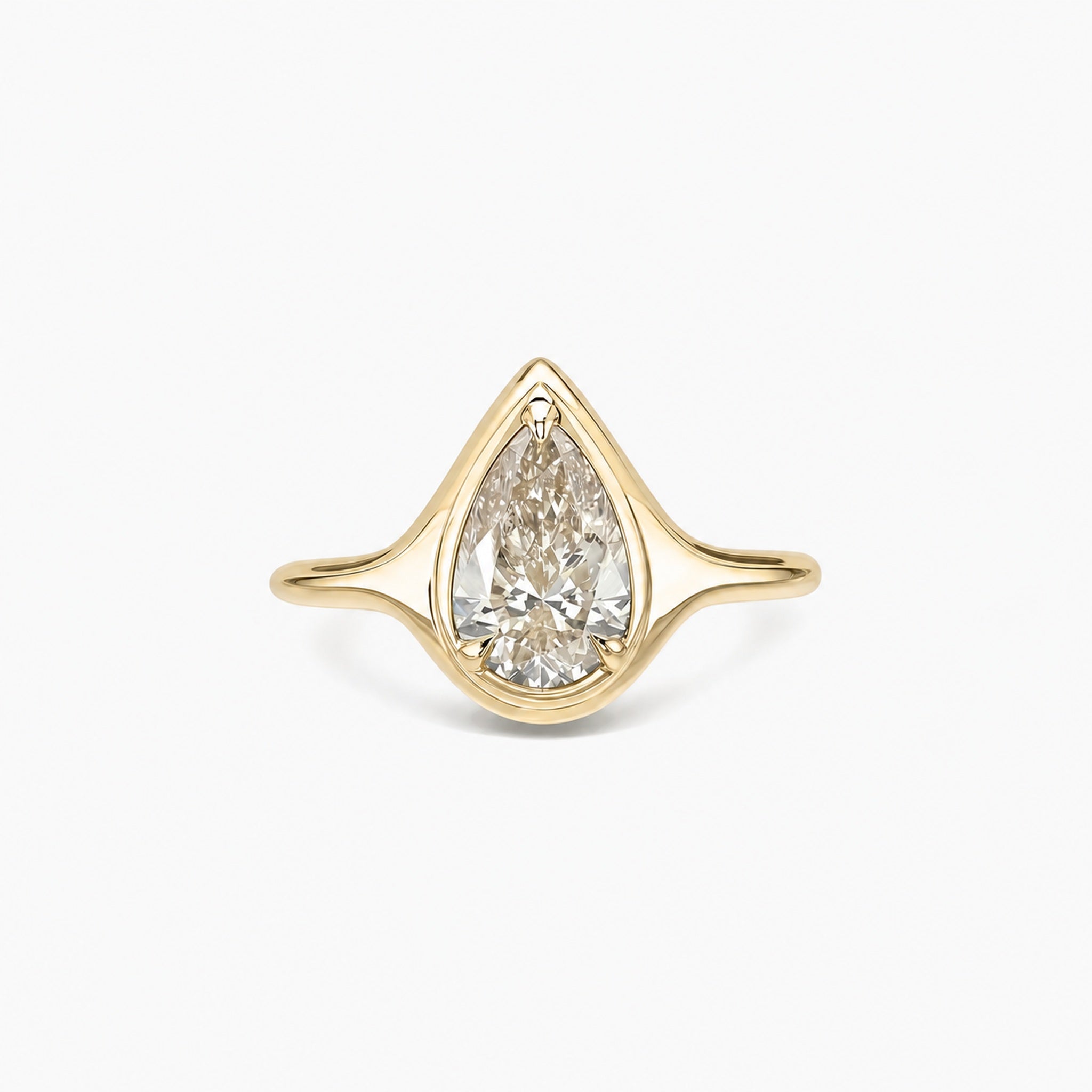 2 ct Pear-Cut Moissanite Bezel-Prong Ring in yellow gold vermeil, front view.