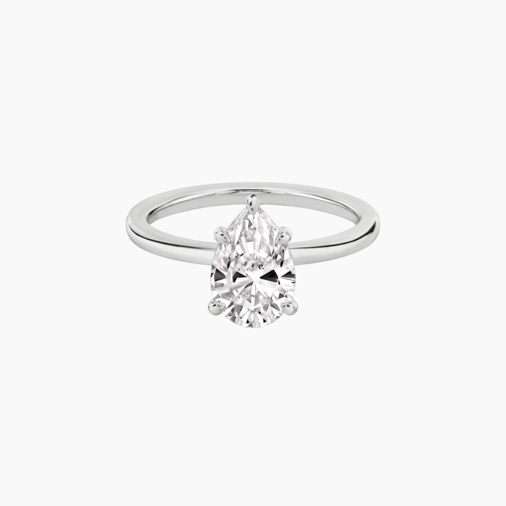 2 ct pear-cut moissanite solitaire ring in white gold vermeil, front view.