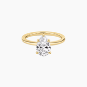 2 ct pear-cut moissanite solitaire ring in yellow gold vermeil, front view.