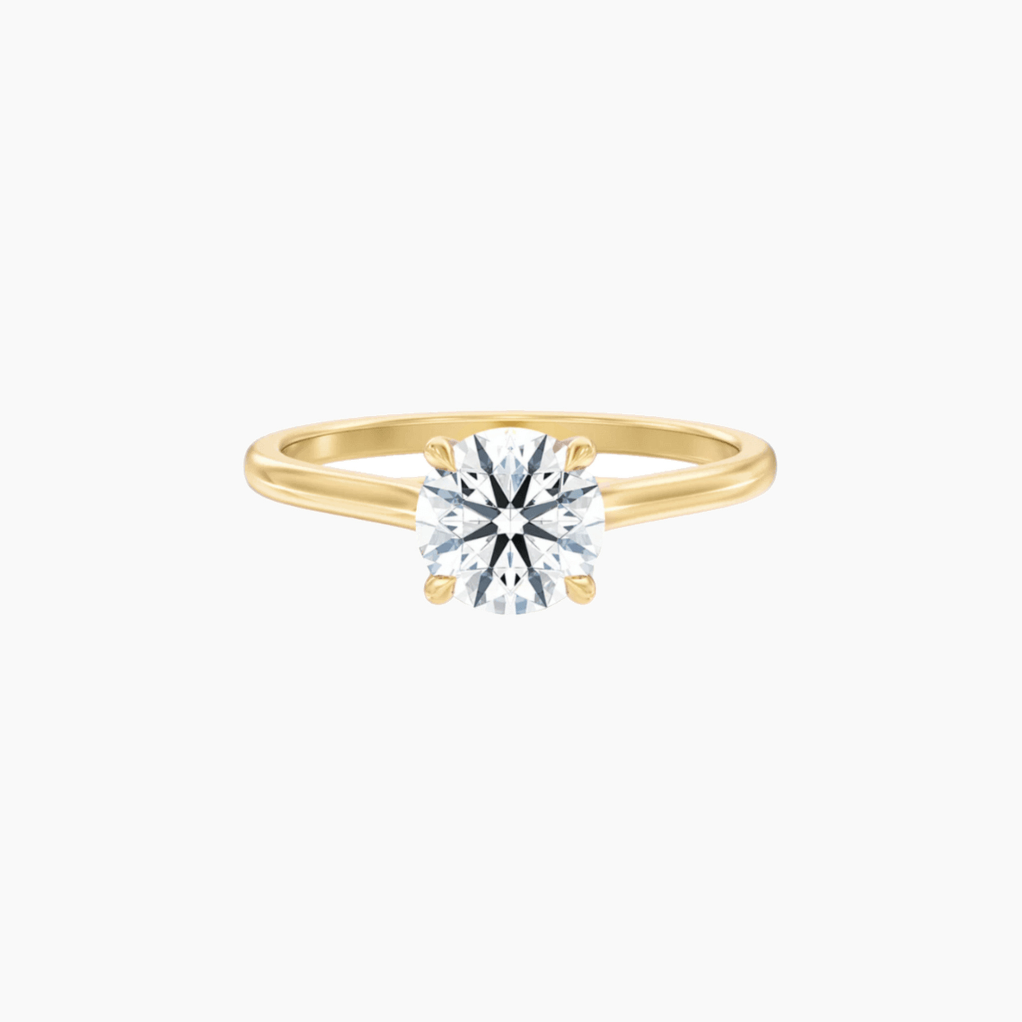 2 ct round-cut moissanite solitaire ring in yellow gold vermeil, front view.
