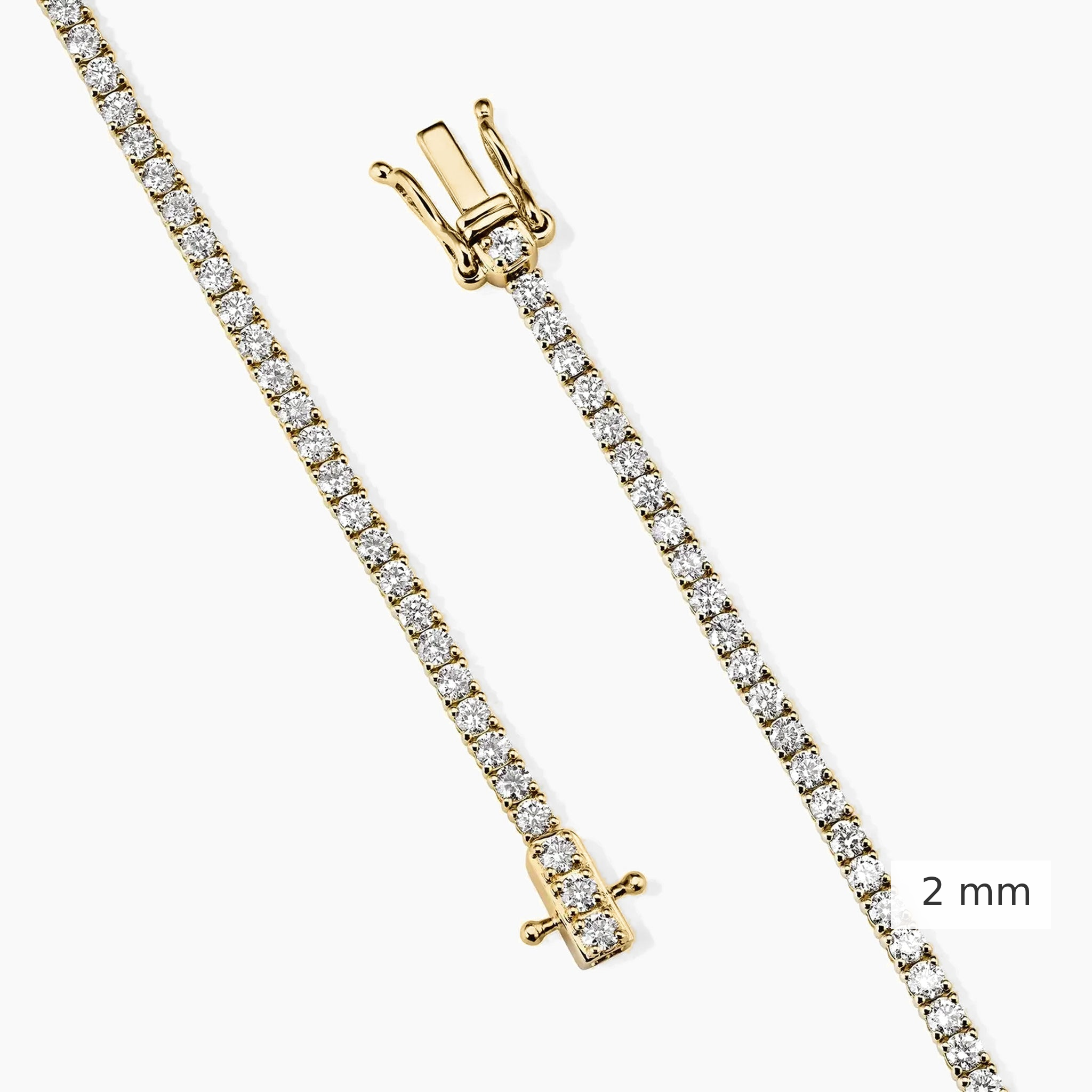 2 mm lab-grown diamond tennis bracelet in yellow gold, clasp detail.