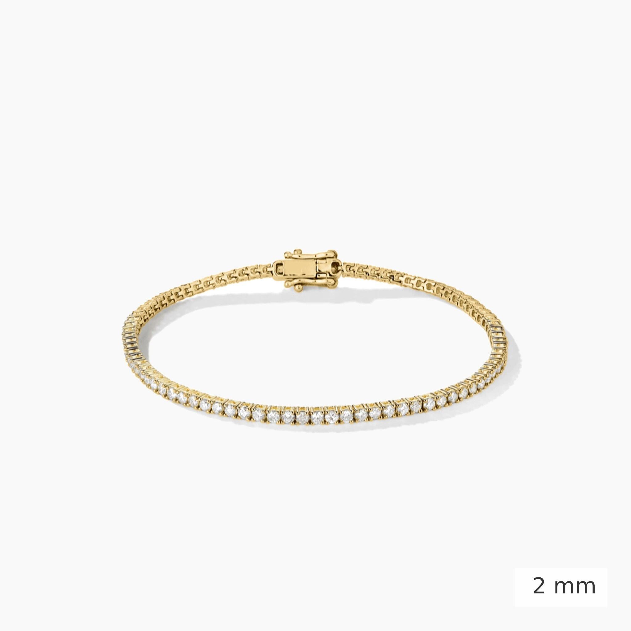 2 mm lab-grown diamond tennis bracelet in yellow gold, closed view.