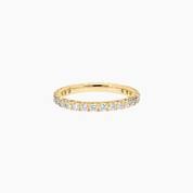 2 mm moissanite eternity ring in yellow gold vermeil, front view.