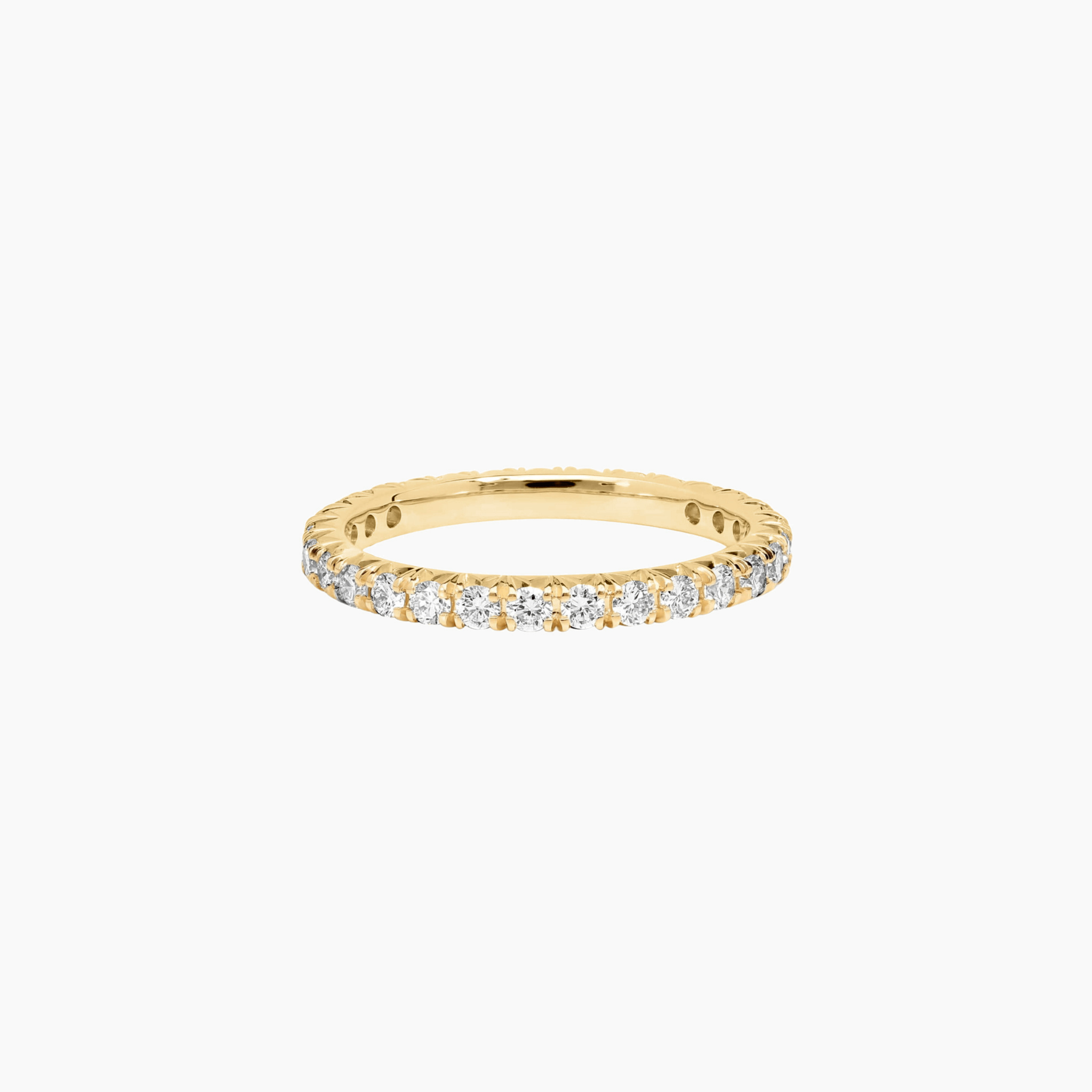 2 mm moissanite eternity ring in yellow gold vermeil, front view.