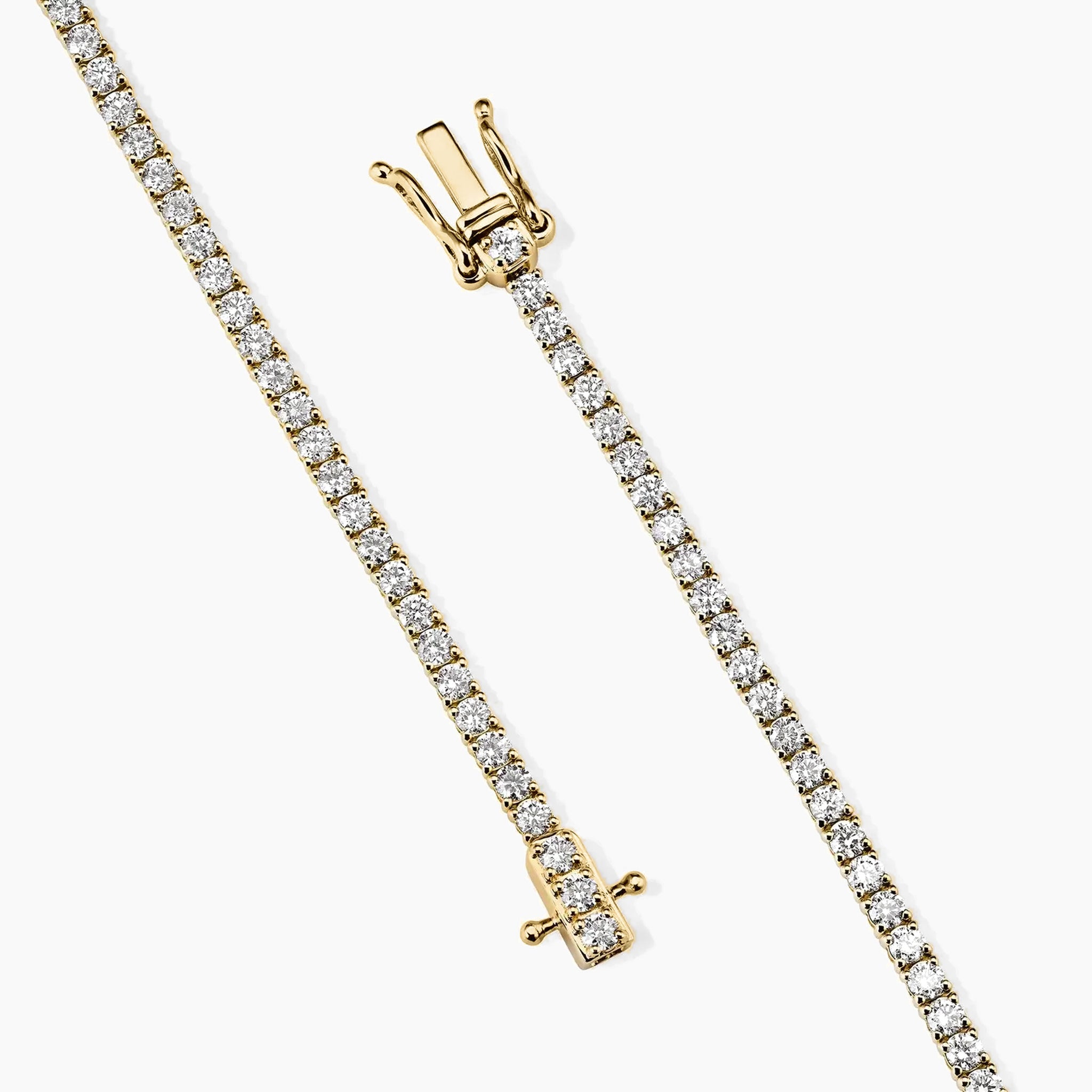 2 mm moissanite tennis bracelet in yellow gold vermeil, clasp detail.