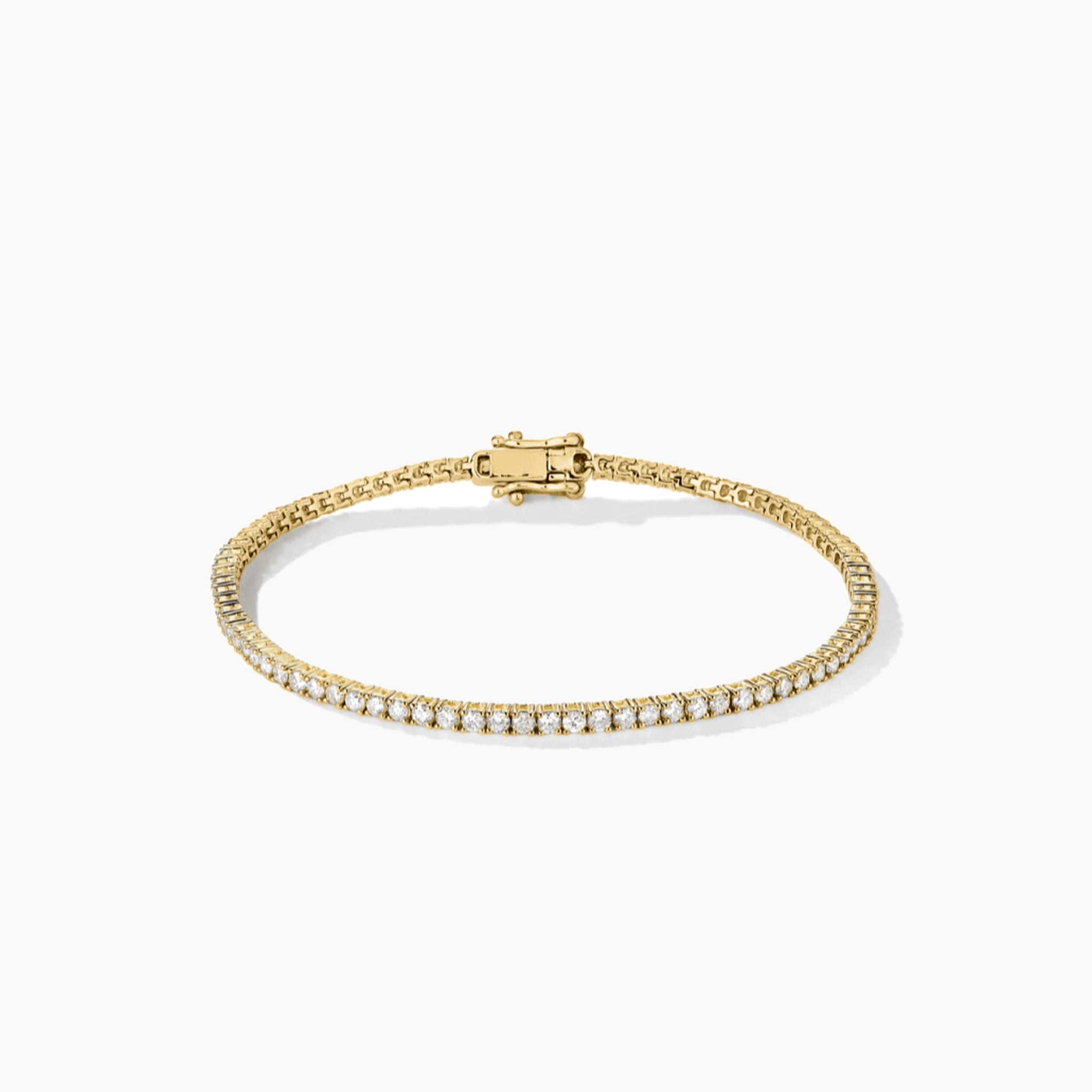 2 mm moissanite tennis bracelet in yellow gold vermeil, closed view.
