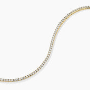 2 mm moissanite tennis bracelet in yellow gold vermeil, close-up detail.