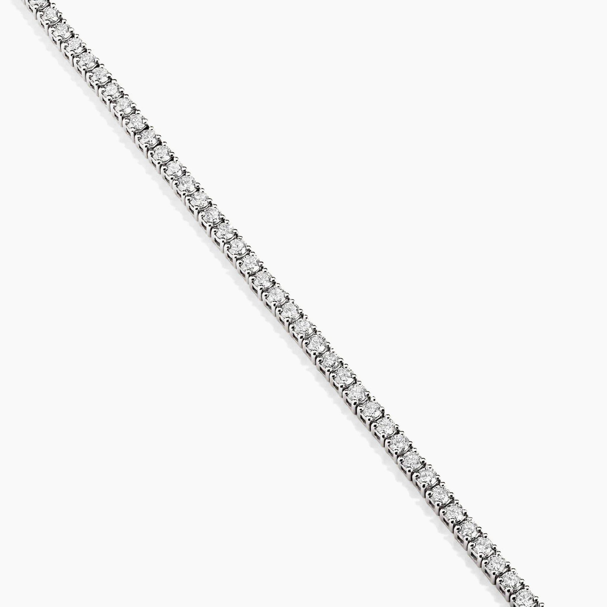 2 mm moissanite tennis necklace in white gold vermeil, close-up detail.