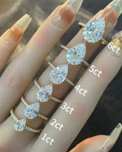 Pear Cut Pavé Hidden Halo Moissanite Ring