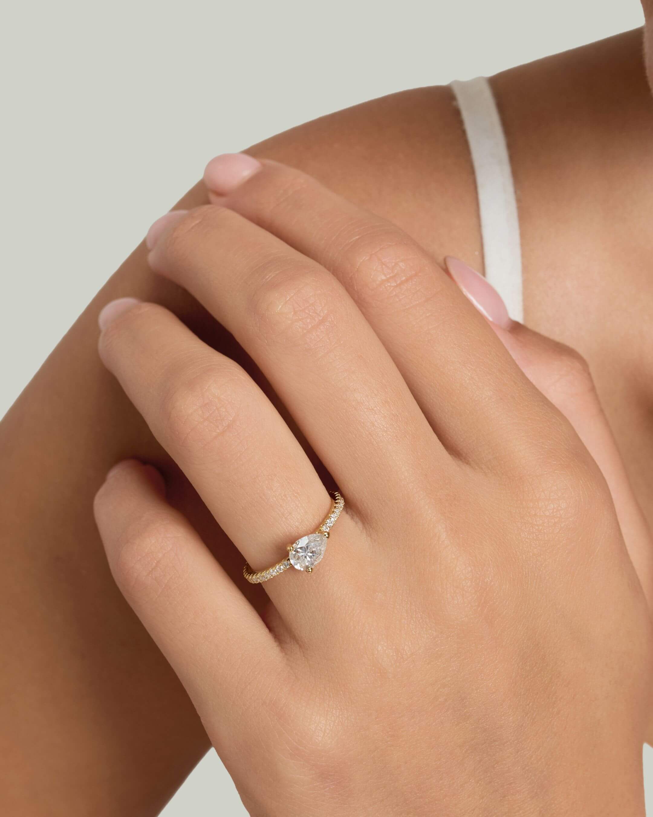 East West Pear Solitaire Pavé Moissanite Ring