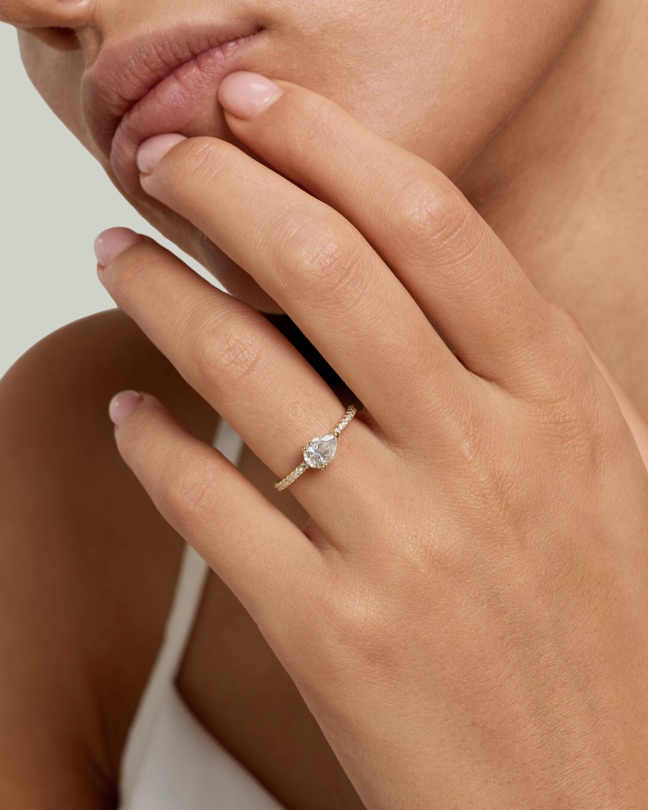 East West Pear Solitaire Pavé Moissanite Ring