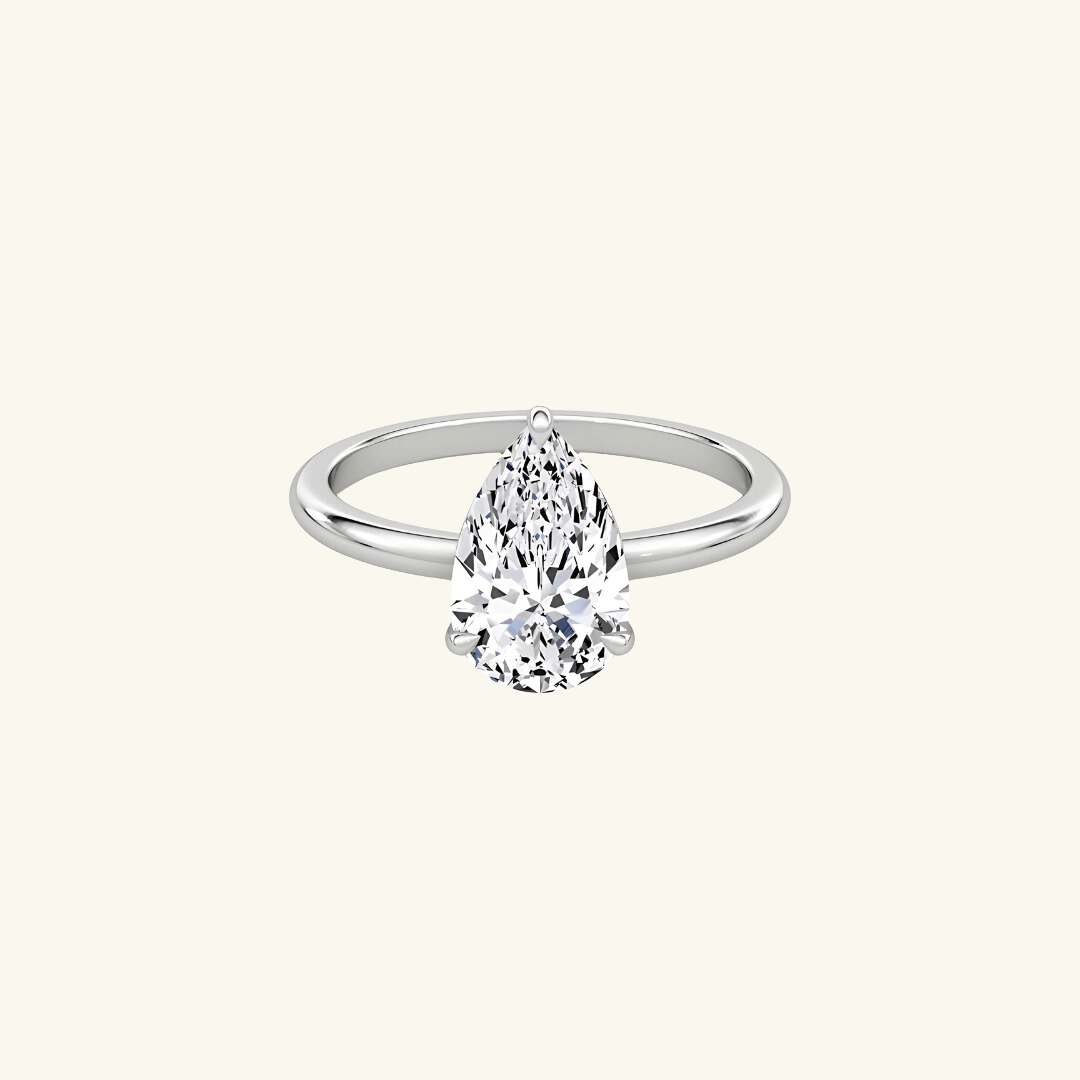 Moissanite Pear Cut Solitaire Ring