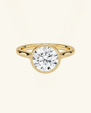 Round-Cut Moissanite Bezel-Set Solitaire Ring