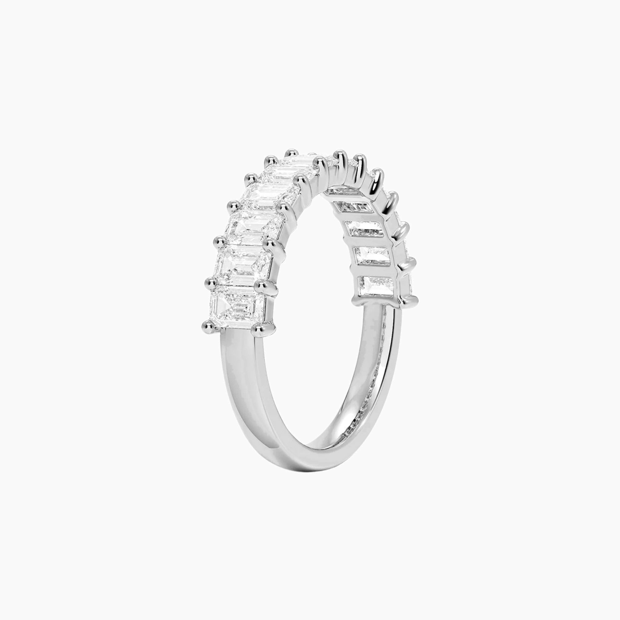 3 ct emerald-cut moissanite half eternity ring in white gold vermeil, side view.