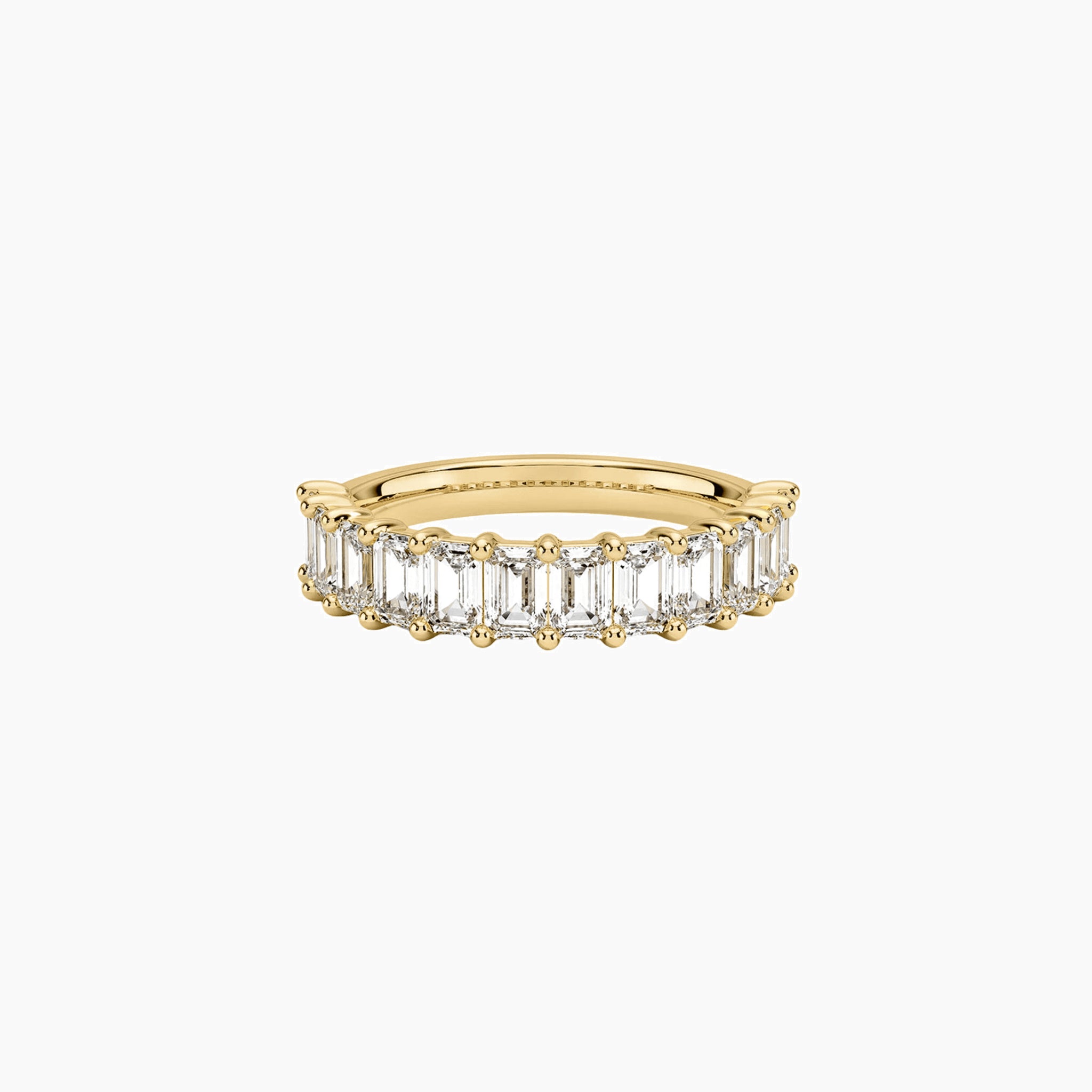 3 ct emerald-cut moissanite half eternity ring in yellow gold vermeil, front view.