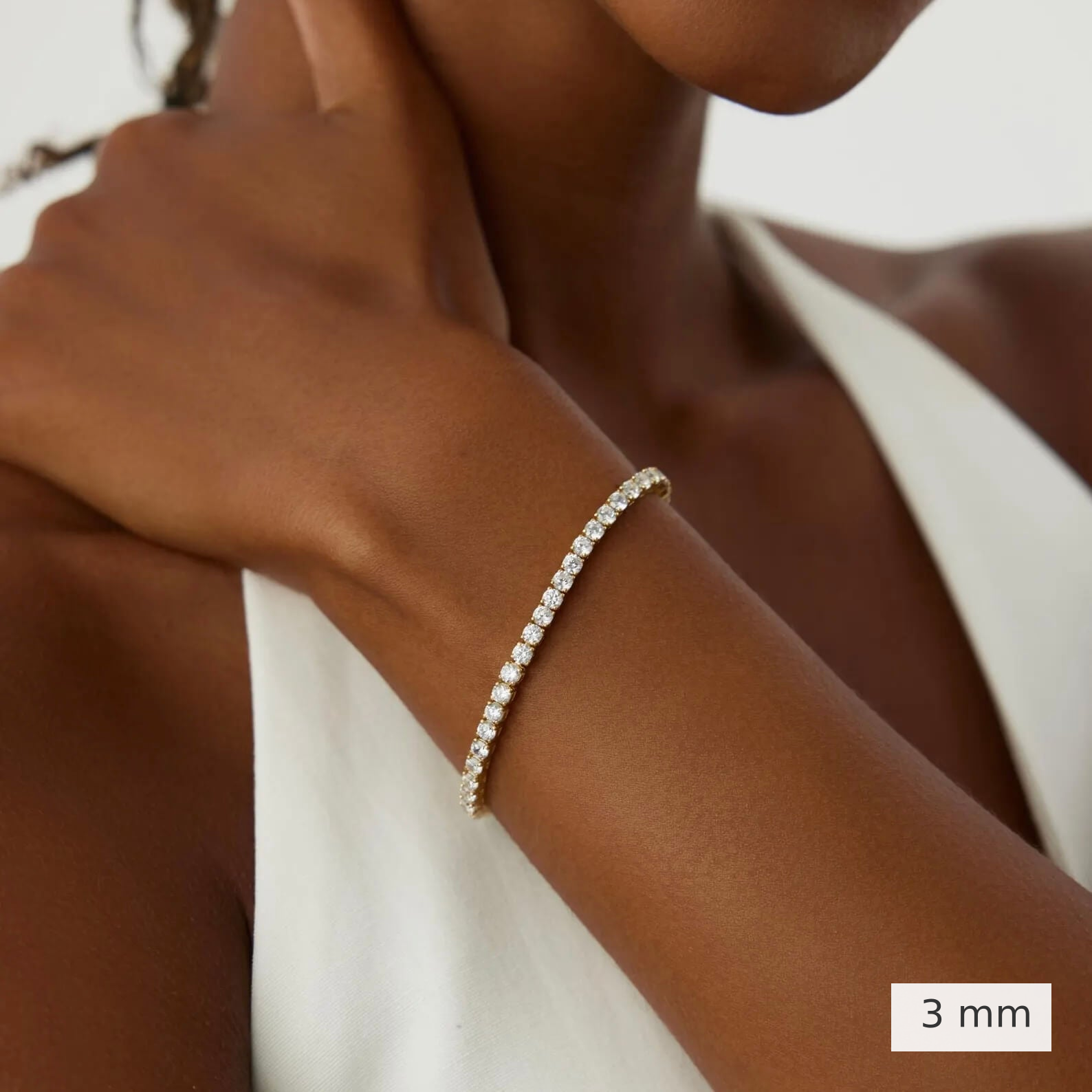 3 mm lab-grown diamond tennis bracelet worn on the wrist.