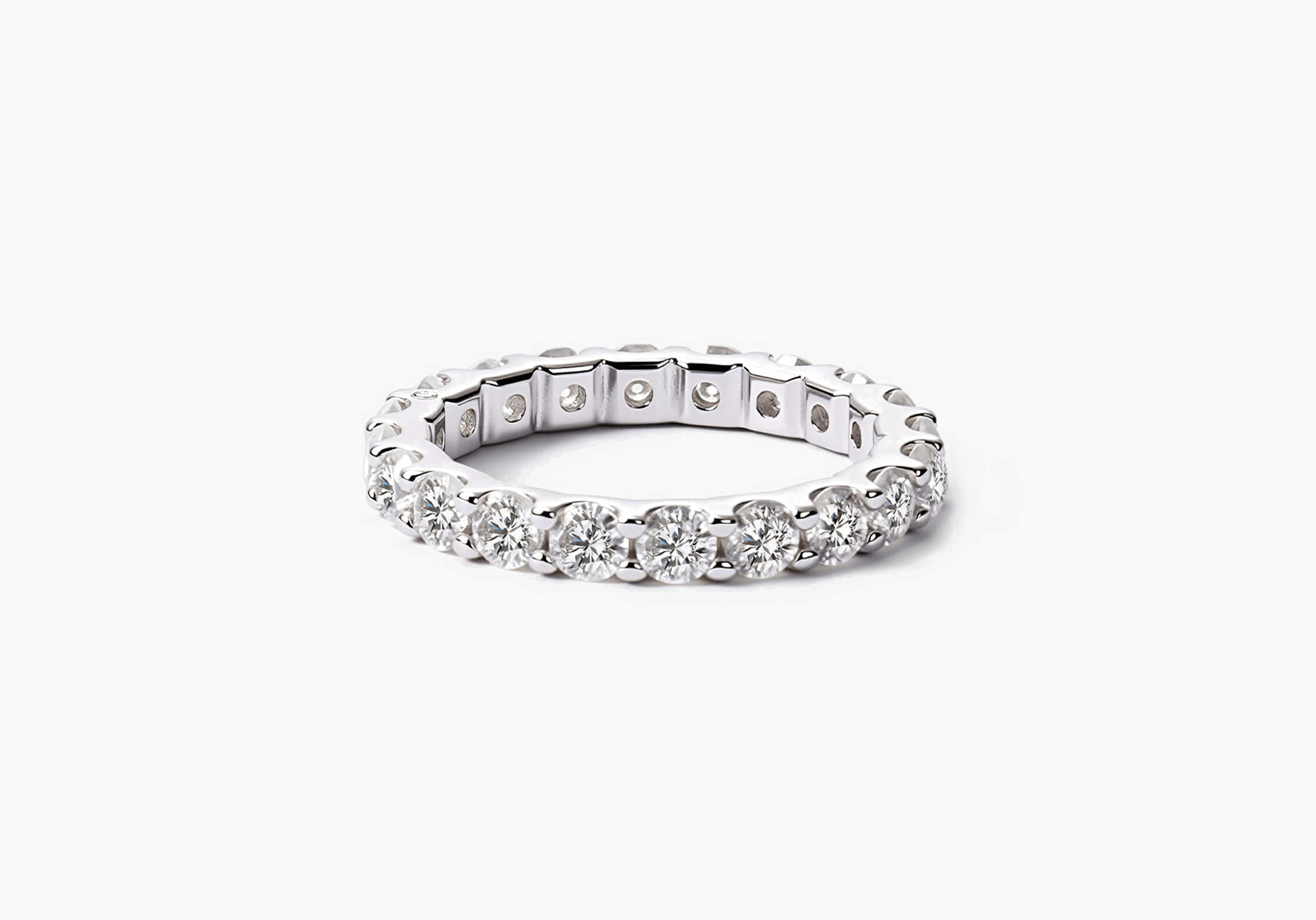 3 mm moissanite eternity ring in white gold vermeil, front view.
