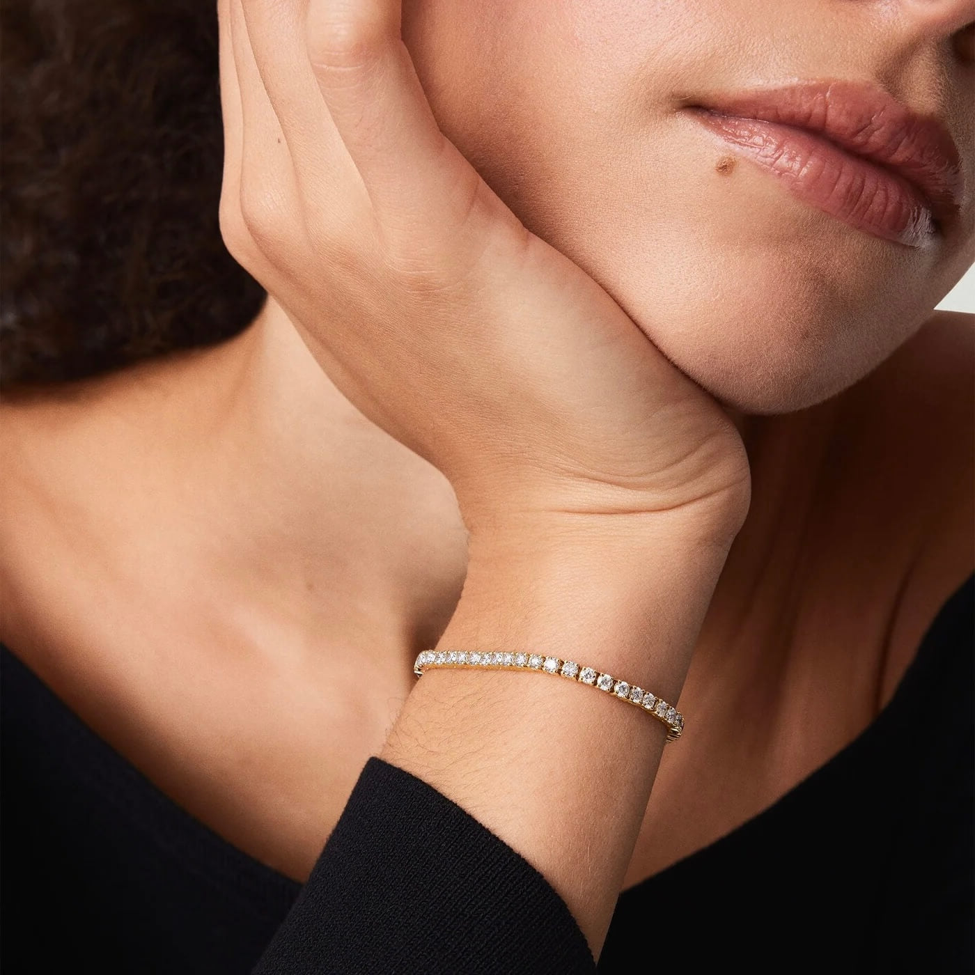 3 mm moissanite tennis bracelet worn on the wrist.