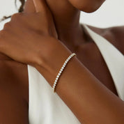 3 mm moissanite tennis bracelet worn on the wrist.