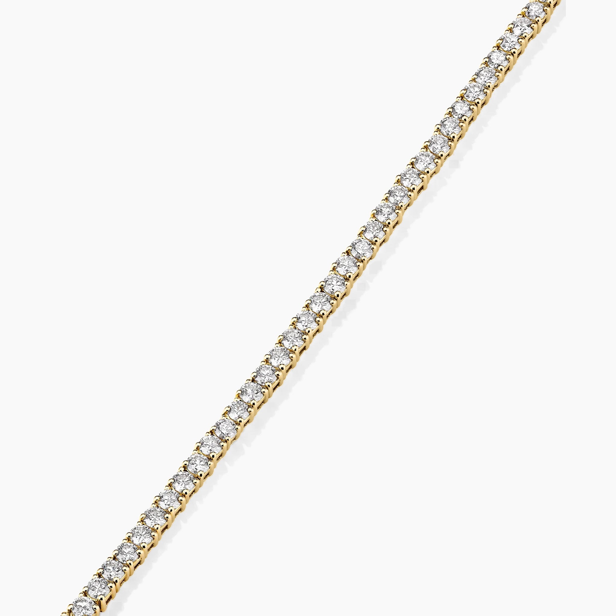 3 mm moissanite tennis bracelet in yellow gold vermeil, close-up detail.