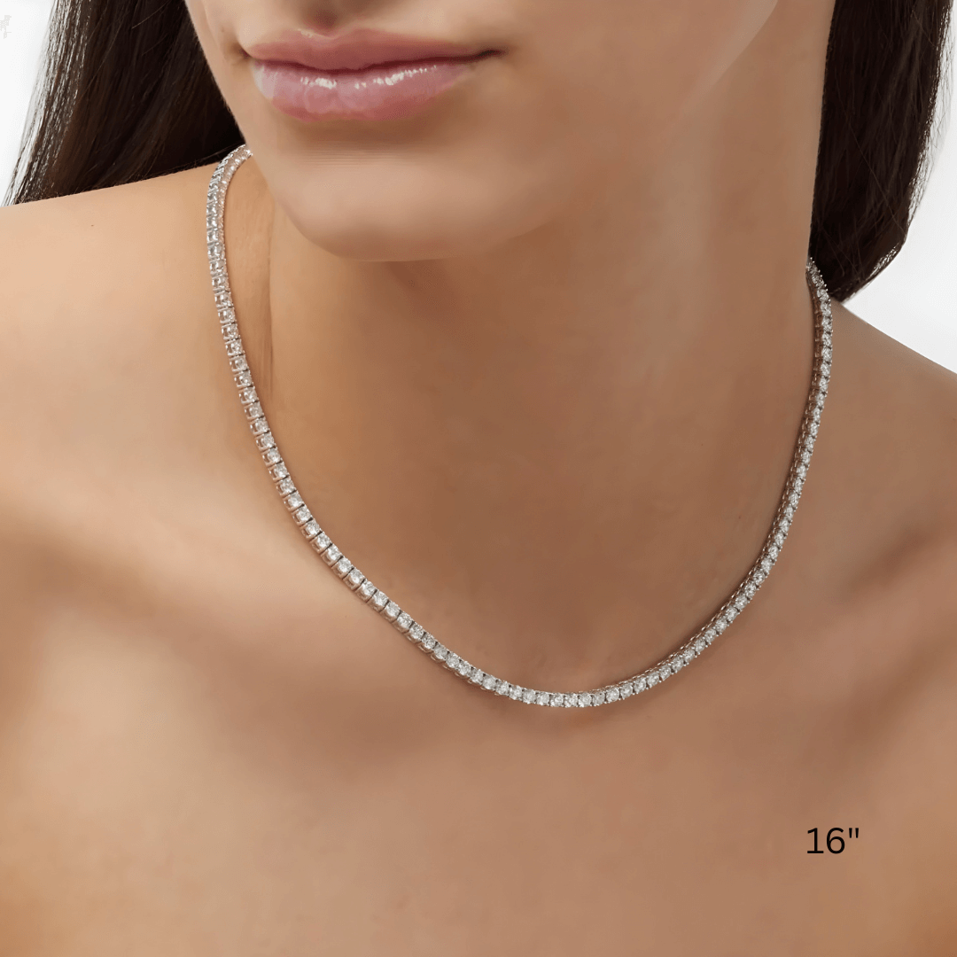 3 mm moissanite tennis necklace worn at the neckline.