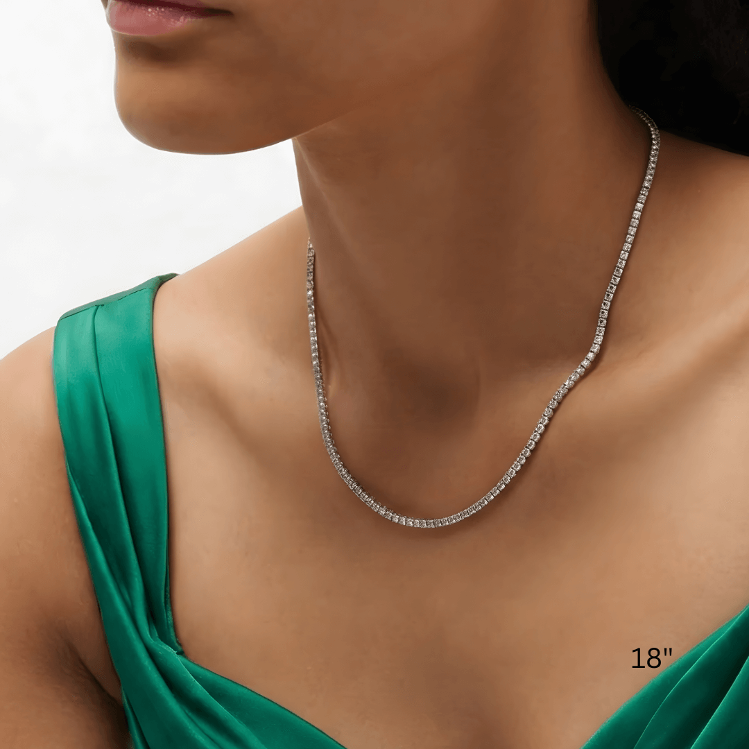 3 mm moissanite tennis necklace worn at the neckline.