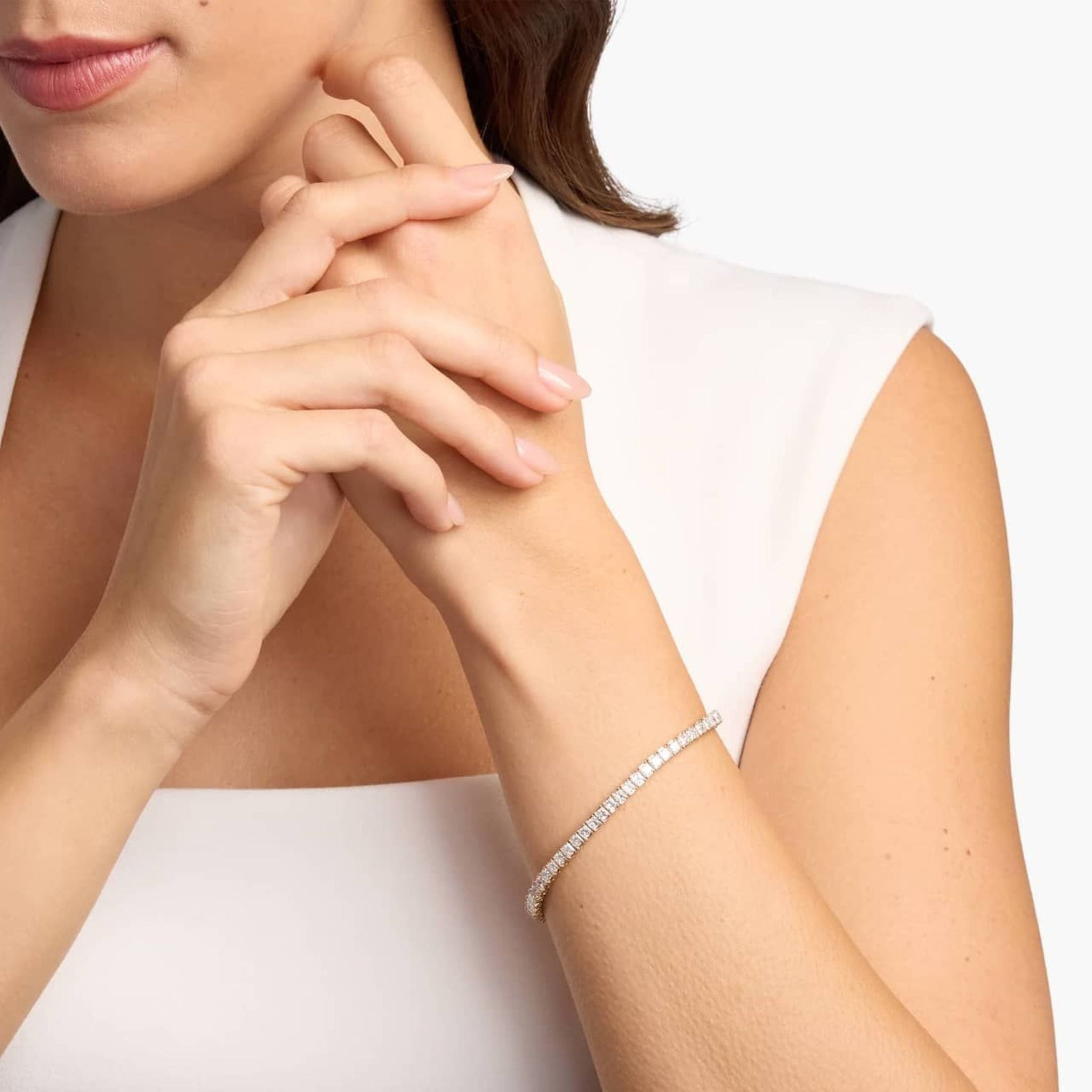 3 mm princess-cut moissanite tennis bracelet worn on the wrist.