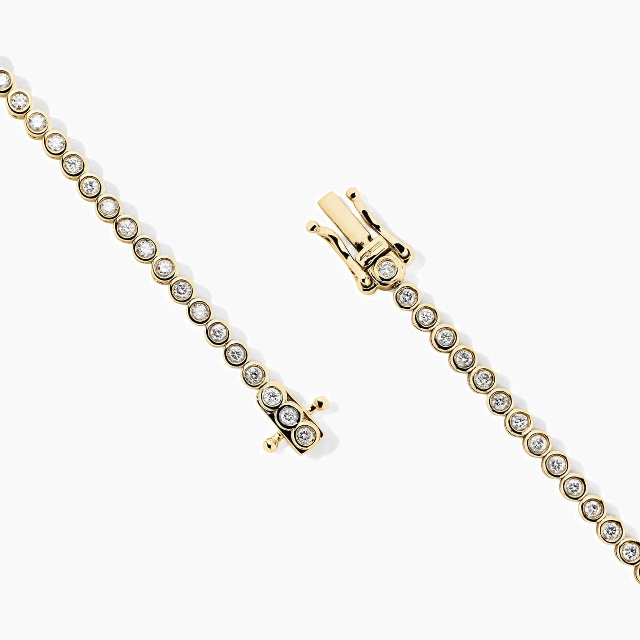 3 mm wide moissanite bezel tennis bracelet in yellow gold vermeil, clasp detail.