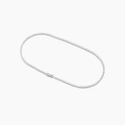 3 mm wide moissanite bezel tennis necklace in white gold vermeil, angled view.
