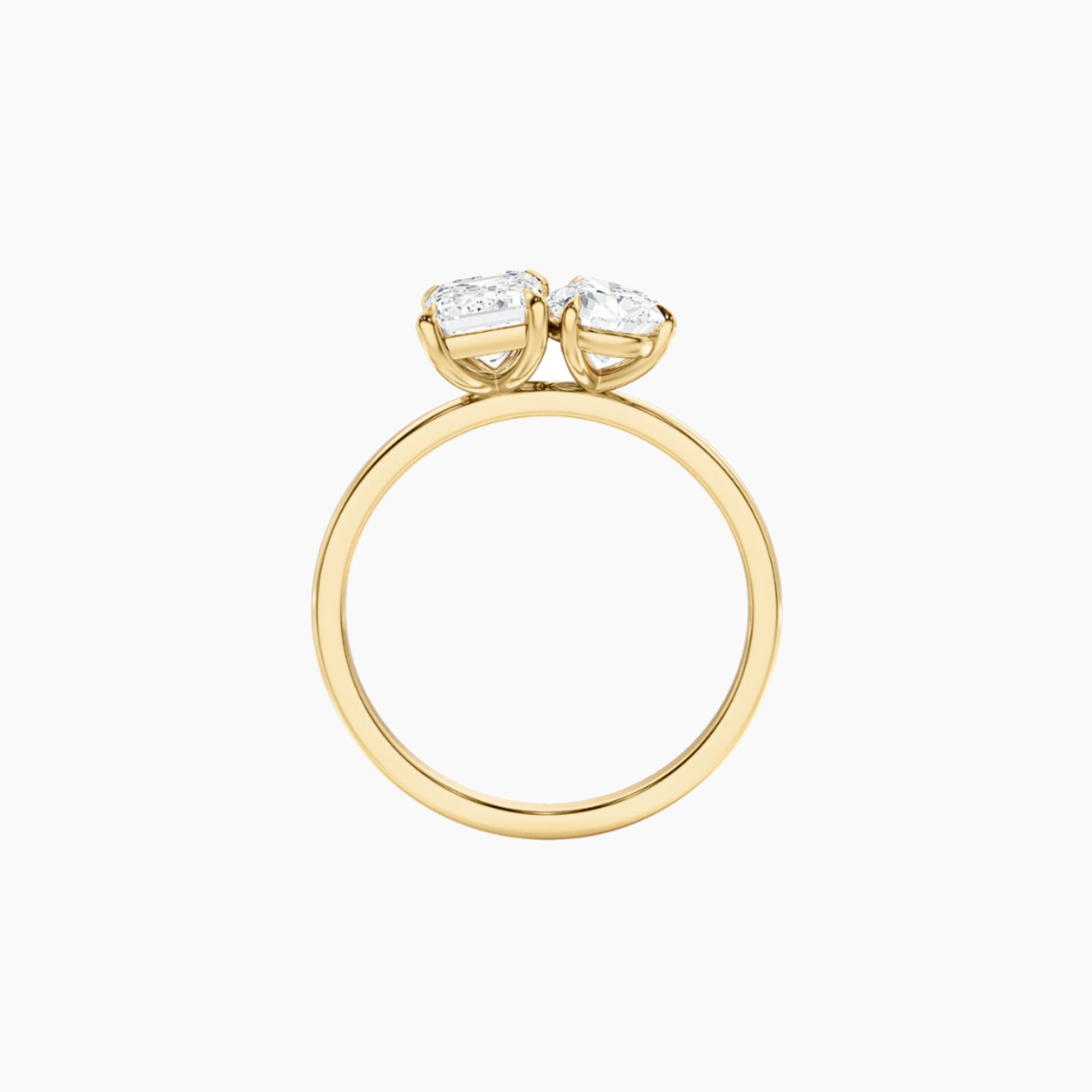 4 ct pear-cut and emerald-cut moissanite toi et moi ring in yellow gold vermeil, back view.
