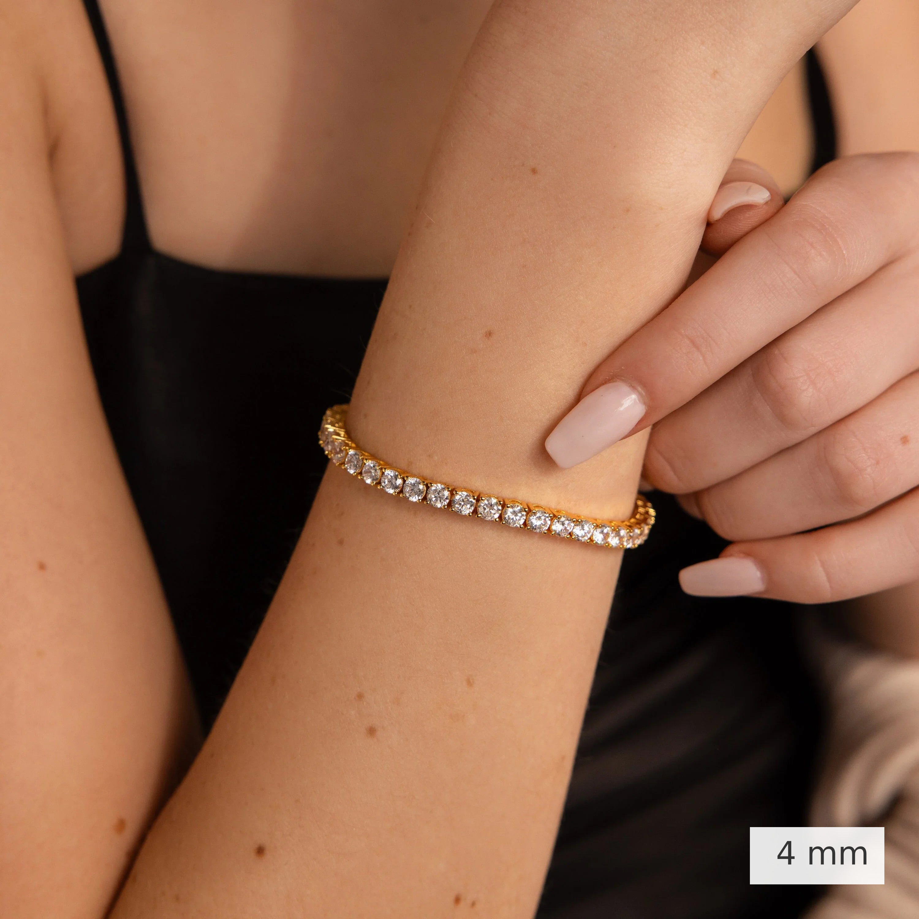 4 mm lab-grown diamond tennis bracelet worn on the wrist.