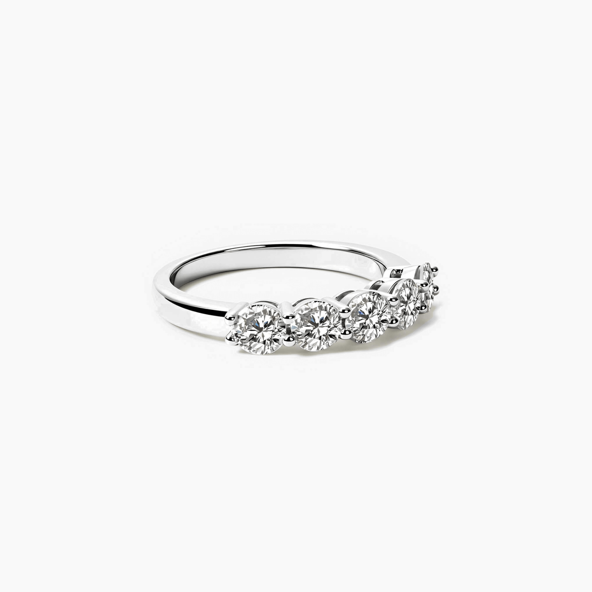 4 mm moissanite half eternity ring in white gold vermeil, angled view.