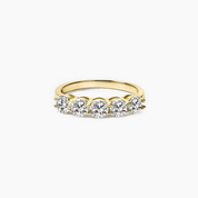 4 mm moissanite half eternity ring in yellow gold vermeil, front view.