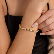 4 mm moissanite tennis bracelet worn on the wrist.