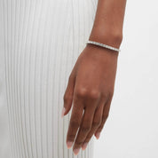 4 mm moissanite tennis bracelet worn on the wrist.