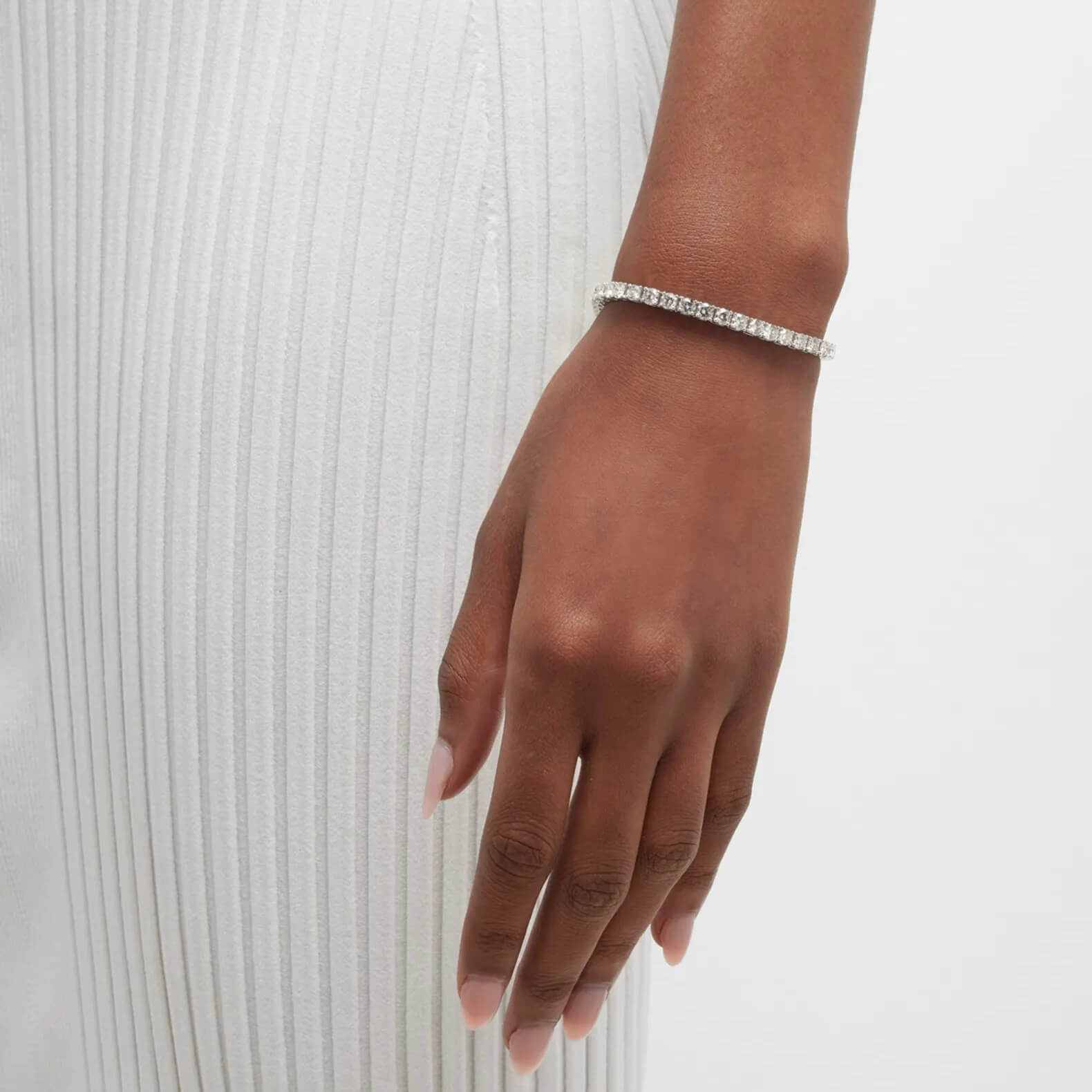4 mm moissanite tennis bracelet worn on the wrist.