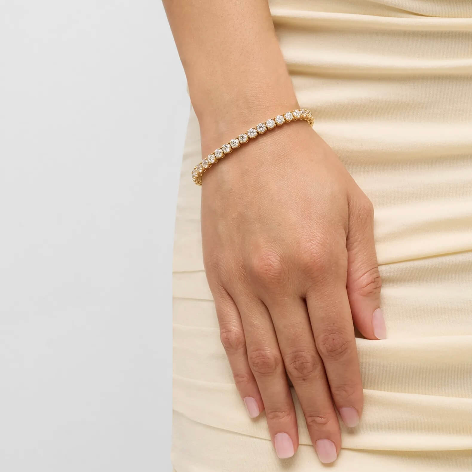 4 mm moissanite tennis bracelet worn on the wrist.