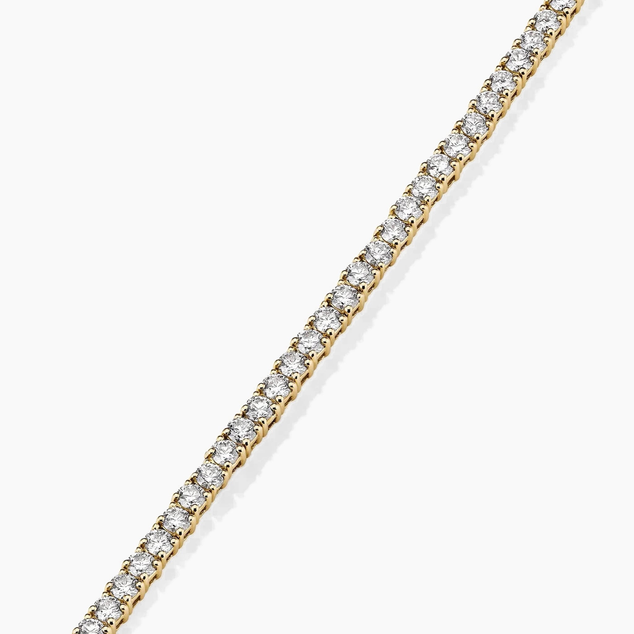 4 mm moissanite tennis necklace in yellow gold vermeil, close-up detail.