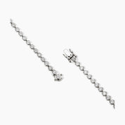 4 mm wide moissanite bezel tennis bracelet in white gold vermeil, clasp detail.