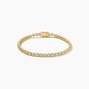 4 mm wide moissanite bezel tennis bracelet in yellow gold vermeil, closed view.