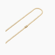 4 mm wide moissanite bezel tennis necklace in yellow gold vermeil, clasp detail.