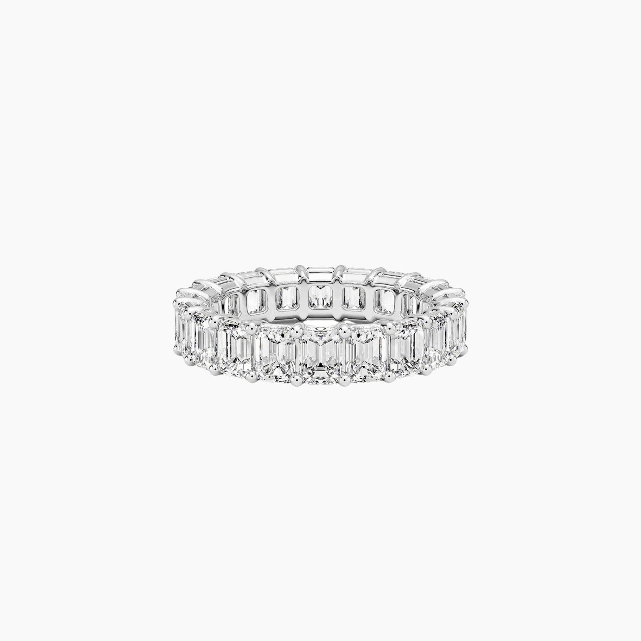 6 ct emerald-cut moissanite eternity ring in white gold vermeil, front view.