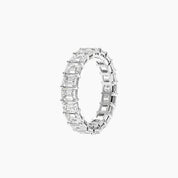 6 ct emerald-cut moissanite eternity ring in white gold vermeil, side view.